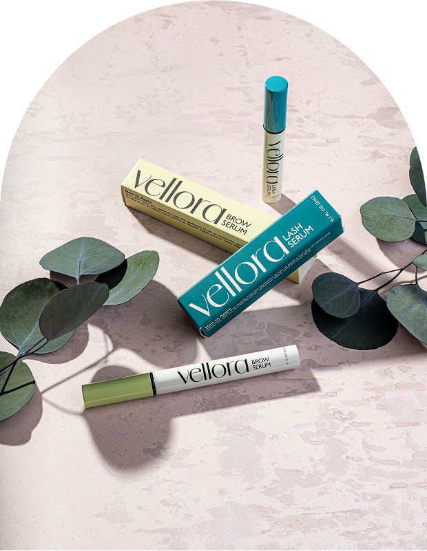 a group of mascaras and leaves